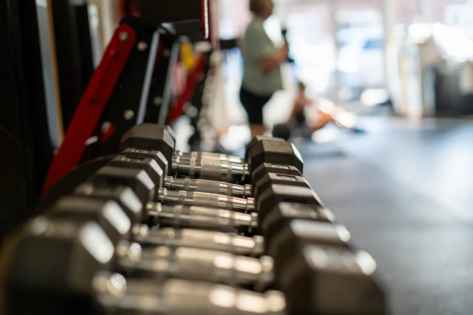 Close-up of a dumbbell rack at Adam Clark Fitness