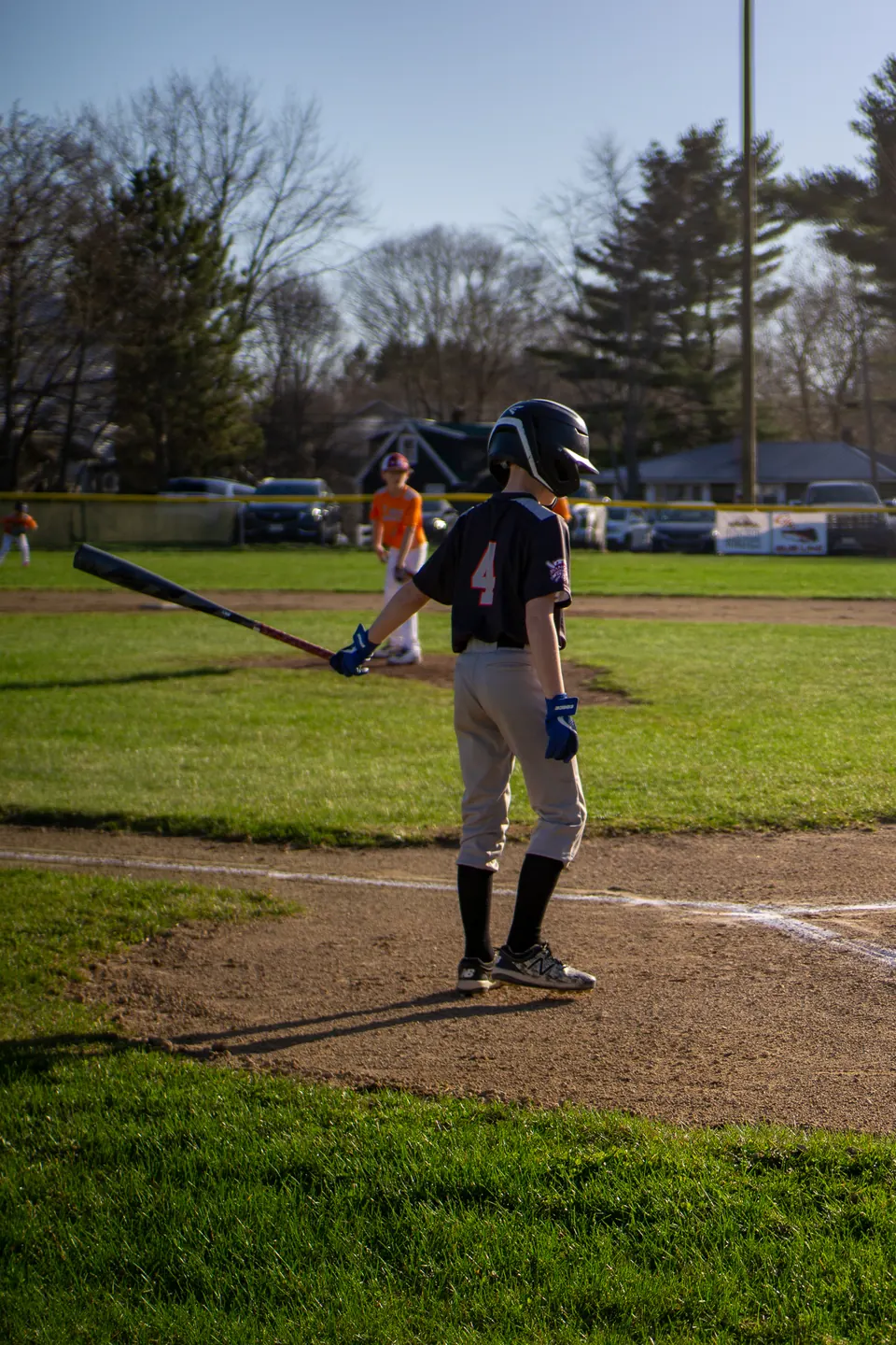Youth baseball batter waiting on a pitch
