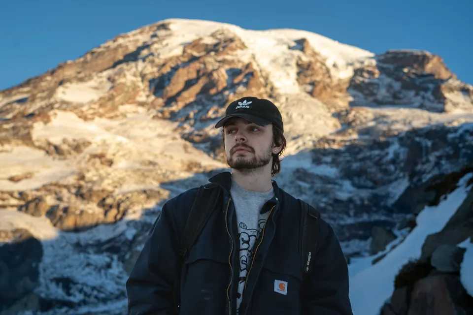 Portrait in front of snowy Mount Rainier